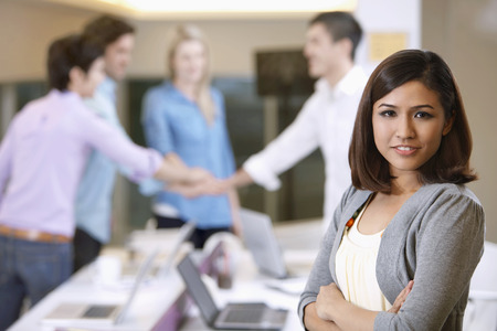 Businesswoman posing for the camera with arms crossedの写真素材