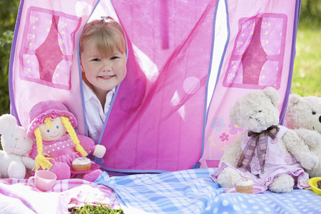 Girl playing in make-believe houseの写真素材