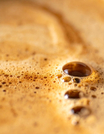 Coffee foam close-up macro photography with shallow depth of fieldの素材