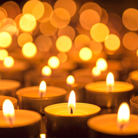 Burning candles in a church, shallow depth of field with blurred backgroundの素材