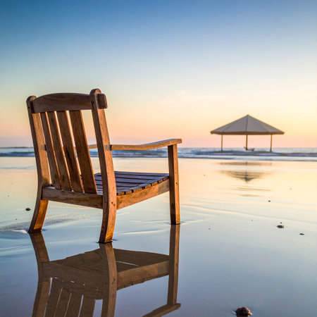Wooden chair on the beach in the morning, sunrise time.の素材