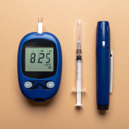 Glucose meter, syringe and insulin pen on brown backgroundの素材