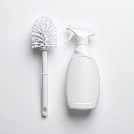 Plastic bottle of detergent and brush on white background, top viewの素材