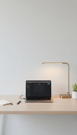 Laptop on a table with a lamp and a notebook. 3d renderingの素材