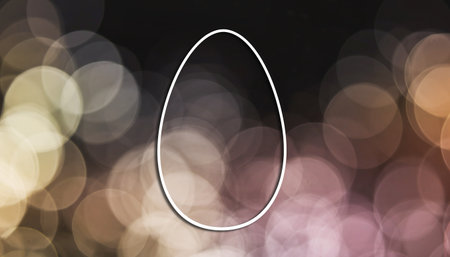 Easter egg on bokeh background. Happy Easter concept.の素材
