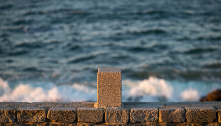Stone blocks on the seashore in the evening. Selective focus.の素材