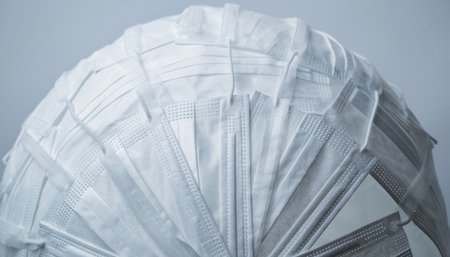 Medical protective mask against the background of the coronavirus pandemic.の素材