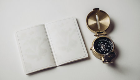 Compass and notebook on white background. Top view, flat layの素材