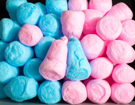 Colorful marshmallows on a black background, close-upの素材