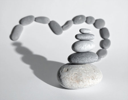 Balanced pebbles on white background. Zen zen conceptの素材