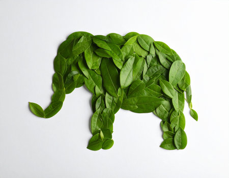 Elephant made of fresh leaves on white background, top view. Ecology conceptの素材