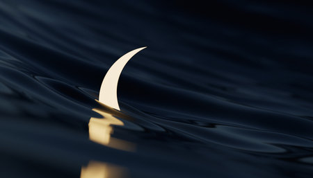 3d render of a crescent moon on a blue water surfaceの素材