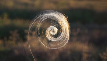 abstract background of a spiral in the field. long shutter speedの素材
