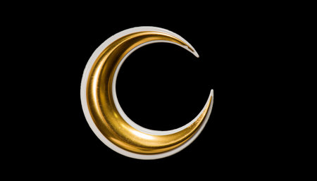 Gold crescent moon on black background. Ramadan Kareem concept.の素材