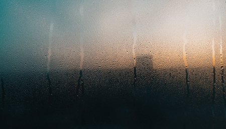 Drops of rain on the window. Abstract background for design.の素材