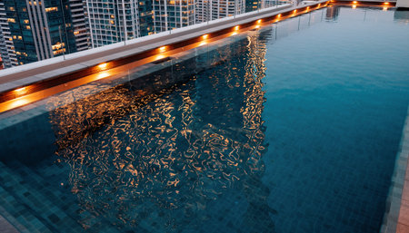 Swimming pool with reflection in Dubai Marina, United Arab Emirates.の素材