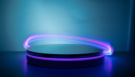 Neon round podium on blue background with copy space. 3D renderingの素材