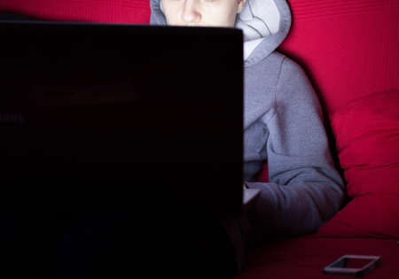 a person types on a computer keyboardの写真素材