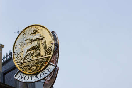 A plate of notary Illustrating the sale of real estate and inheritance rightsのeditorial素材