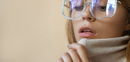 Stylish beautiful fashion girl wear trendy sunglasses, close up banner.の写真素材