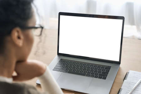 Over shoulder view of white blank empty mockup screen for advertising.