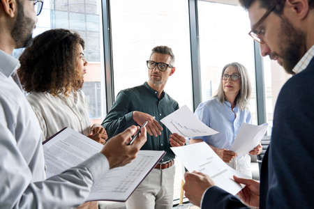 Multietnic business executive team having discussion at office meeting.