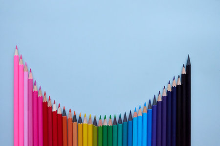 Many color pencils wave on grey background, flatlay. Back to schoolの写真素材