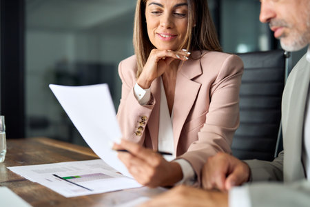 Lawyer showing document to client providing legal consultancy services concept.の写真素材