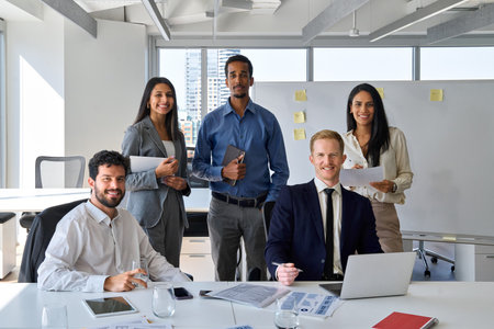 Happy professional diverse team business people in office meeting room. Portraitの写真素材
