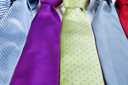 Row of colorful men's tiesの写真素材