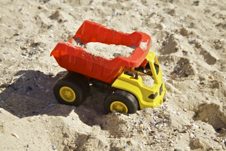 Toy truck in the sandの写真素材