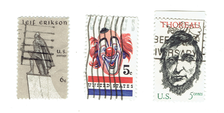 UNITED STATES: Arrange of different used stamps Lief Erikson, Circus with clown icon and Henry David Thoreau, writer andÂ Â circa 1967. Printed in United States of Americaのeditorial素材