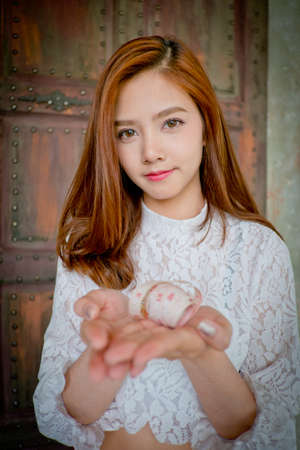 Beautiful fashion designer standing in studio, Hold the line measurementsの写真素材