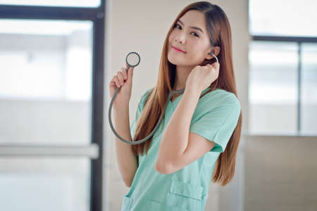 Happy doctor smiling at camera.The photos from inside the building.の写真素材