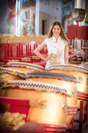 Asian Chinese woman in Traditional Chinese,by background ambience China .の写真素材