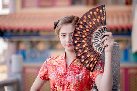 Asian Chinese woman in Traditional Chinese,by background ambience China .の写真素材