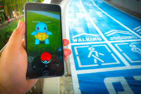 BANGKOK, THAILAND - August 12,2016: Pokemon Go gameplay screenshot on the phone. Pokemon Go is a...