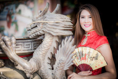 Asian Chinese woman in Traditional Chinese,by background ambience China .の写真素材