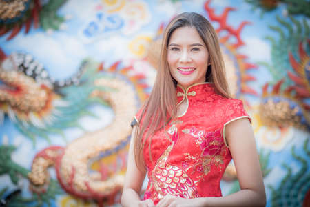 Asian Chinese woman in Traditional Chinese,by background ambience China .
