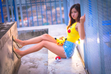BANGKOK, THAILAND â€“ August 24,2016:  Trainer  girl   playing pokemon , pokemon ball , Wear...