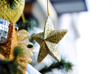 Christmas ornament with stars in the sky as a backdrop の写真素材