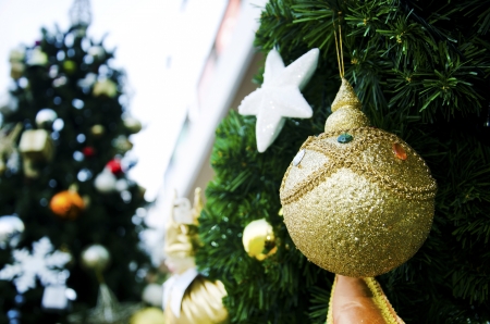 Christmas ornament with stars in the sky as a backdrop の写真素材