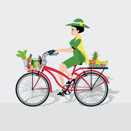 Women are driving a bike with a basket of fruits and vegetables.のイラスト素材