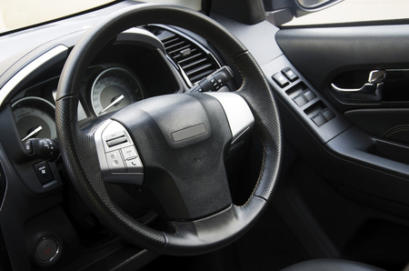 Car steering wheel in the car console.の写真素材