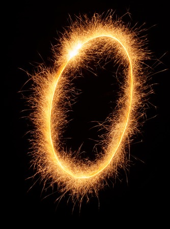 "0" number drawn with bengali sparkles isolated on black backgroundの写真素材
