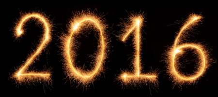 "2016" number drawn with bengali sparkles isolated on black backgroundの写真素材
