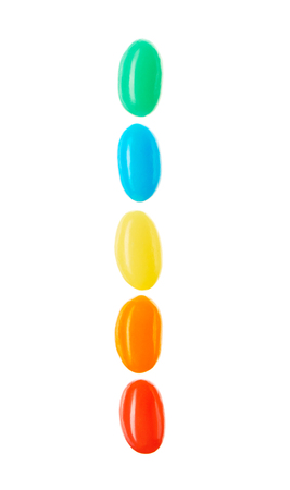 I letter made of multicolored candies isolated on white backgroundの写真素材