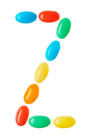 Z letter made of multicolored candies isolated on white backgroundの写真素材