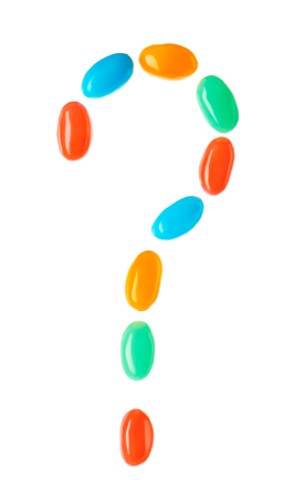 Question mark symbol made of multicolored candies isolated on white backgroundの写真素材