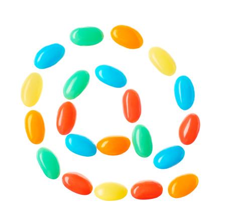AT symbol, email address icon made of multicolored candies isolated on white backgroundの写真素材
